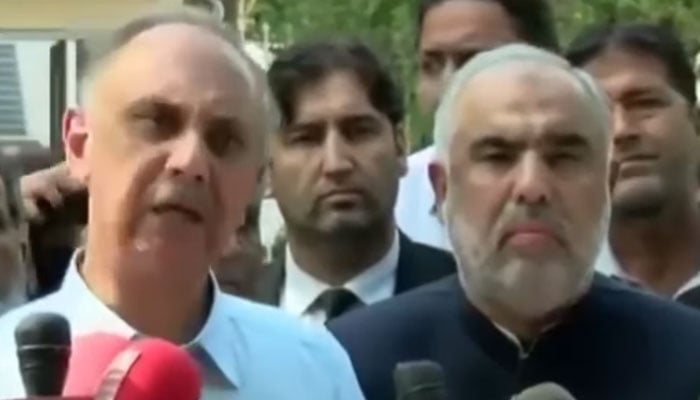 PTIs Opposition Leader in the National Assembly Omar Ayub Khan and former speaker Asad Qaiser speak to the media on September 11, 2024. — Screengrab via Facebook/Omar Ayub Khan