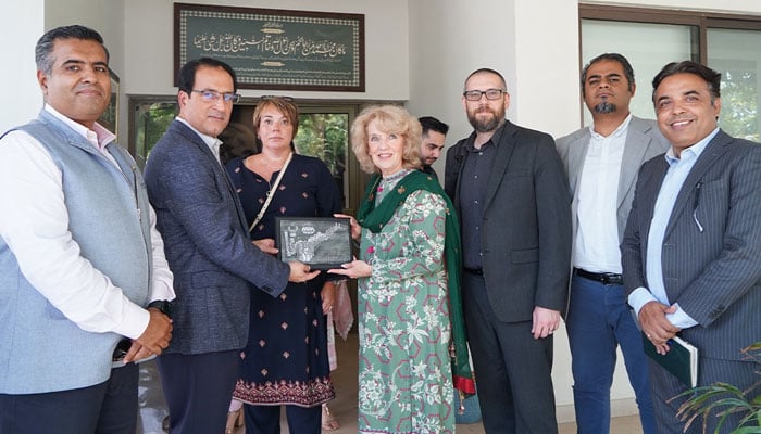 CBD Punjab CEO Imran Amin (left) presents a souvenir to Scotlands Trade Ambassador to Pakistan Dr Jeanette Forbes during a visit of a delegation from the Scotland Chamber of Commerce and Robert Gordon University at CBD Punjab on September 12, 2024. — Facebook/Central Business District Punjab