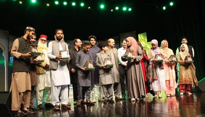 Representational image shows participants and officials standing on stage at a Naat Competition on October 25, 2023. — PNCA - Pakistan National Council of the Arts