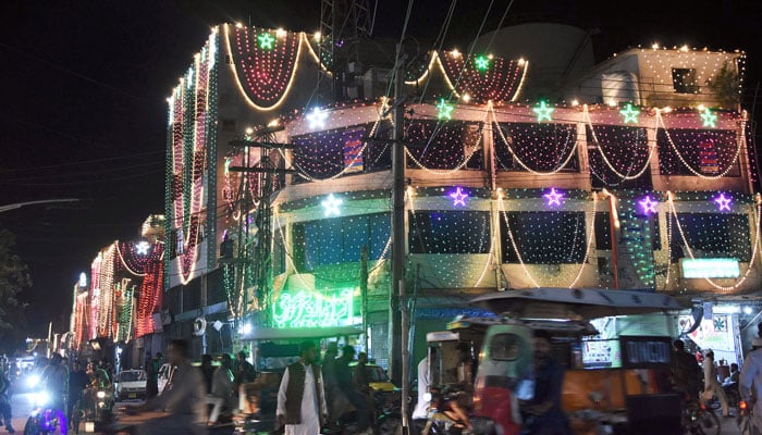 This representational image shows an illuminated view of buildings decorated with colourful lights in connection with Eid Milad-un-Nabi (PBUH), in the city on September 12, 2024. — Online