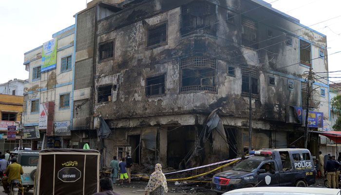 View of site after a fire erupted in a shop located on Shah Faisal Colony No.03 in Karachi on September 12, 2024. — PPI