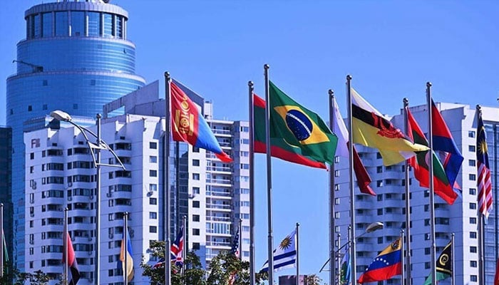 Flags of various countries flutter at the venue of the 11th Xiangshan Forum at the Beijing International Convention Center on September 12, 2024. — AFP