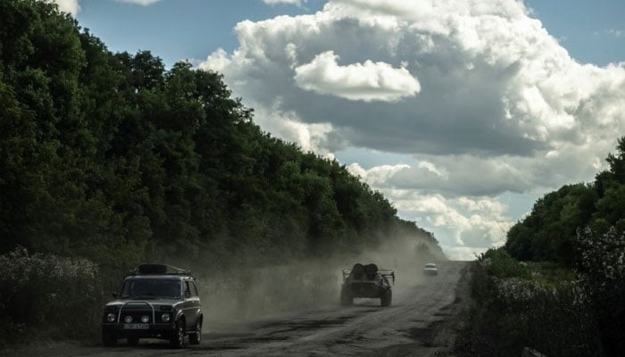 Ukrainian service members ride an Armoured Personnel Carrier, amid Russias attack on Ukraine, near the Russian border in Sumy region, Ukraine August 12, 2024. — Reuters