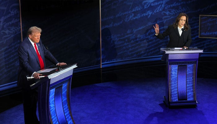 Democratic presidential nominee, US Vice President Kamala Harris speaks during a presidential debate hosted by ABC as Republican presidential nominee, former U.S. President Donald Trump listens, in Philadelphia, Pennsylvania, US, September 10, 2024. — Reuters