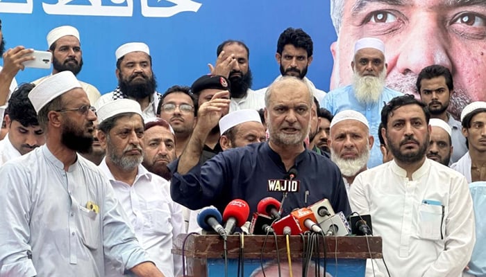 Jamat-e-Islami (JI) Chief Hafiz Naeemur Rehman talking to media persons during the launching ceremony of the party membership campaign, in Peshawar on September 13, 2024. — PPI