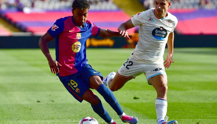 Teenage forward Lamine Yamal (left) playing for Barcelona. — AFP/file