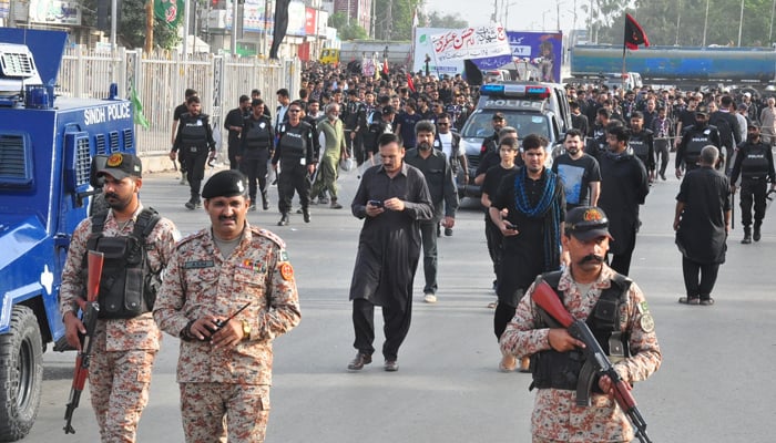 The Chup Tazia mourning procession is passing through MA Jinnah Road Karachi under the security of police and rangers of Sindh on September 13, 2024. — Reporter