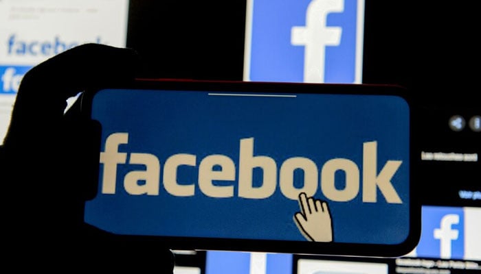 The Facebook logo is displayed on a mobile phone in this picture illustration taken December 2, 2019. — Reuters