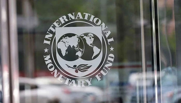 The seal of the International Monetary Fund is seen at the headquarters building in Washington, DC. — AFP/File