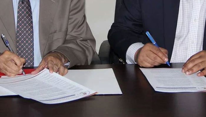 This representational image shows officials signs a MOU during signing ceremony. — APPNA Website/File