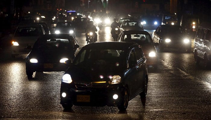 A representational image showing vehicles move along a road in Karachi on January 15, 2016. — Reuters