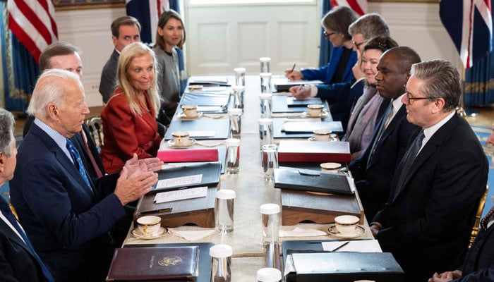 US President Joe Biden (L) and British Prime Minister Keir Starmer (R) participate in a bilateral meeting in the Blue Room of the White House in Washington, DC, on September 13, 2024. — AFP