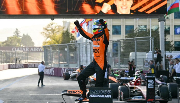 McLarens Oscar Piastri celebrates a tense win on the streets of Baku © Andrej ISAKOVIC / AFP