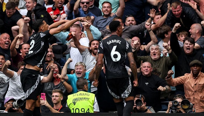 Arsenal defender Gabriel Magalhaes celebrates scoring against Tottenham. — AFP/file