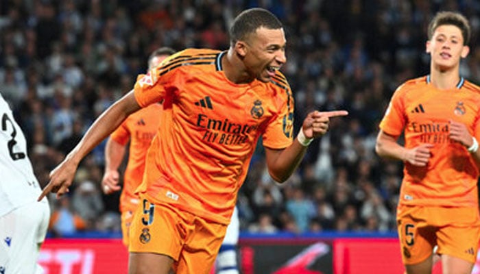 Real Madrids Kylian Mbappe celebrates after scoring his sides second goal from a penalty kick during a Spanish La Liga soccer match between Real Sociedad and Real Madrid at the Reale Arena in San Sebastian, Spain, Saturday, Sept. 14, 2024. — AFP