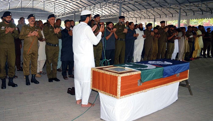 Inspector General Police (IGP) Punjab Dr Usman Anwar (3rd from left) along with others offer a funeral prayer of martyred police Constable Arshad Rauf in Lahore on September 15, 2024. — PPI