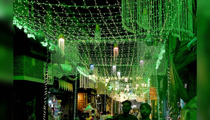 An illuminated inside view of the Bhaati Gate at the old city decorated with colourful lights in connection with Eid Milad-un-Nabi celebrations on September 15, 2024. — APP