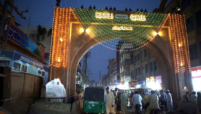 A beautiful illuminated view of street decorated with lights in connection of 12th Rabi-ul-Awwal the Birthday Ceremony of Holy Prophet (P.B.U.H) coming ahead, at Kabuli Gate in Peshawar on Sunday, September 15, 2024. — PPI