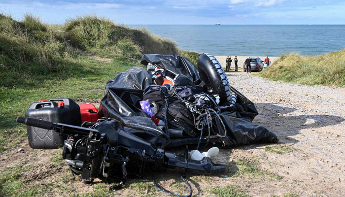 This photograph taken on September 15, 2024, shows a damaged migrants boat after a failed attempt to cross the English Channel that led to the death of 8 people near the beach of Ambleteuse, northern France. — AFP