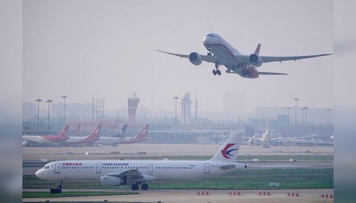 A China Eastern Airlines aircraft and Shanghai Airlines aircraft are seen in Hongqiao International Airport in Shanghai, China June 4, 2020. — Reuters