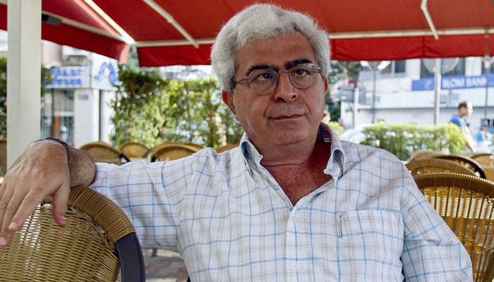 Lebanese writer Elias Khoury sits for an interview at a Beirut cafe on September 9, 2007. — AFP