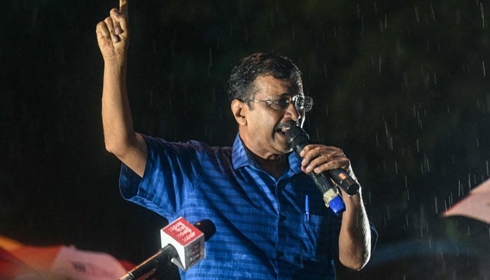 Indian opposition leader Arvind Kejriwal addresses his supporters after Supreme Court granted him bail in New Delhi on September 13, 2024. — AFP