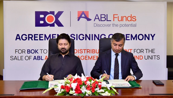 Head Liability & Business Development Division Bank of Khyber (BoK) Zarak Khan and CEO of ABL Funds Naveed Nasim are signing MoU seen in this image released on September 13, 2024. — Facebook/@TheBankofKhyber