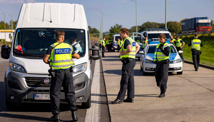 Officers from the German Federal Police stopped a van on September 28, 2023. — AFP