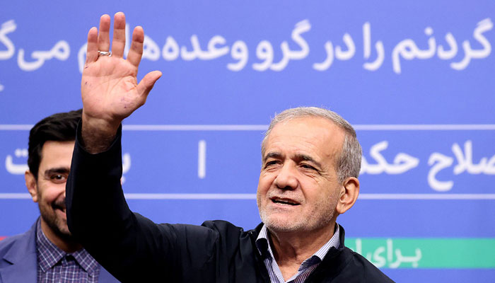 Irans President Masoud Pezeshkian gestures as he speaks to reporters during his press conference in Tehran on September 16, 2024. — AFP