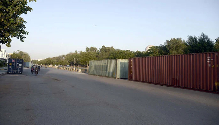 Containers are being placed for security arrangements at Jinnah Mausoleum in Karachi on April 22, 2024. — PPI