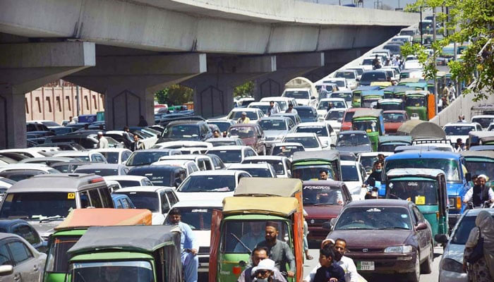 A view of massive traffic jam in front of High Court in Peshawar on April 22, 2024. — APP