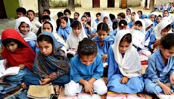 A representational image showing girls attending a class at a school in Khyber Pakhtunkhwa. — AFP/File