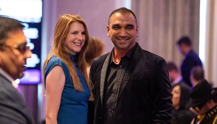 British High Commissioner to Pakistan Jane Marriott and Pakistani fashion designer Omar Mansoor at London Fashion Week. — Reporter