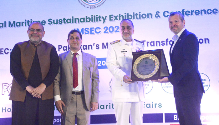 Secretary General of International Maritime Organization (IMO) Arsenio Dominguez giving a memento to Pakistani maritime officer on the conclusion of International Maritime Sustainability Exhibition and Conference Pakistan 2024 at a local hotel September 14. — APP