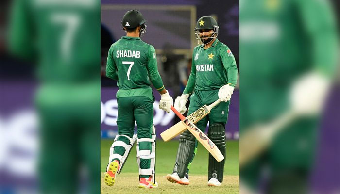 Asif Ali, Shadab Khan celebrate after winning T20 clash against Afghanistan. — AFP/file