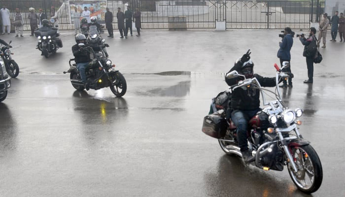 Participants take part during first-ever Road Bike Rally in front of Mazar-e-Quaid-e-Azam, in Karachi on February 2, 2024. — Online