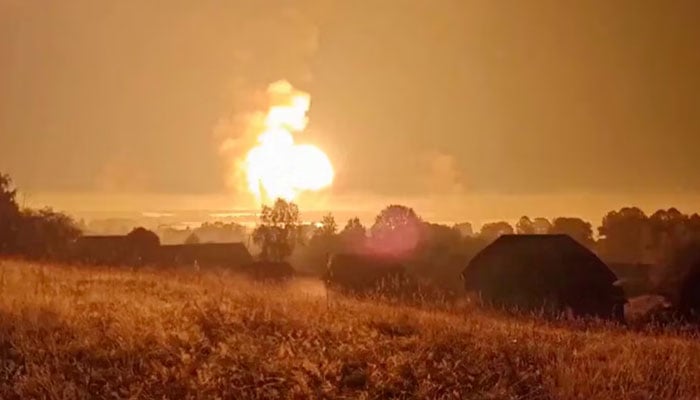 Flames rise during an explosion, amid the Russia-Ukraine conflict, in Toropets, Tver region, Russia in this screen grab obtained from a social media video released on September 18, 2024. — Reuters