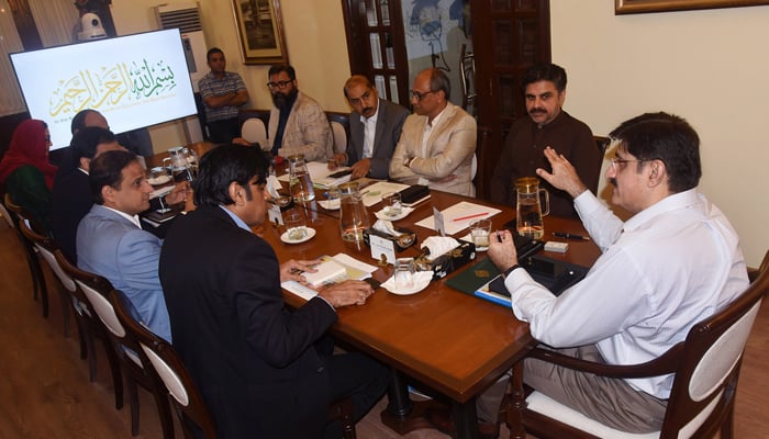 Sindh Chief Minister Syed Murad Ali Shah presides over a meeting to assess the damage caused to the city roads by the 2024 heavy rainfall at CM House September 18, 2024. — Facebook/@SindhCMHouse