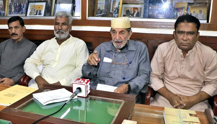 All Pakistan Wapda Hydro Electric Workers Union General Secretary, Khursheed Ahmed (centre), along with others addresses media persons at a press conference in Lahore on September 19, 2024. — PPI