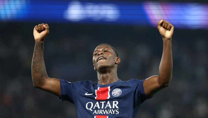 Nuno Mendes celebrates after a goalkeeping mistake allowed PSG to snatch a late winner against Girona.  — AFP