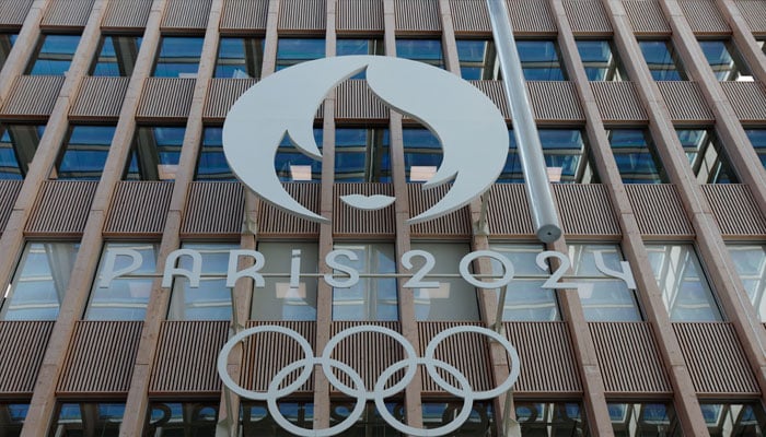 The logo of the Paris 2024 Olympics is pictured on the building of the Organising Committee headquarters ahead of a press conference. — Reuters