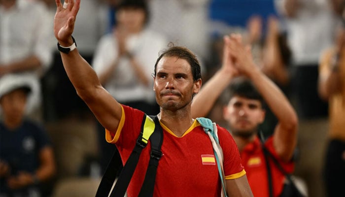 Rafael Nadal (L) and teammate Carlos Alcaraz after their elimination in the doubles at the Paris 2024 Olympics. — AFP