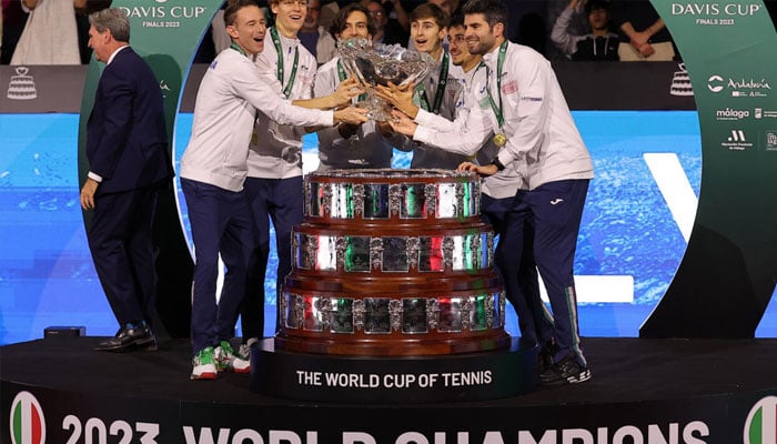 Italian team lifting the Davis Cup.— AFP/file