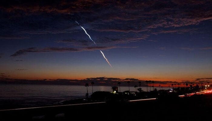 An evening launch of a SpaceX Falcon 9 rocket carrying 20 Starlink V2 Mini satellites is seen over the Pacific Ocean from Encinitas, California, US, June 23, 2024. — Reuters