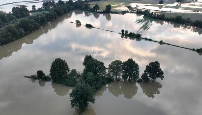 A Polish area hit by strong wind and heavy rains. — AFP/file