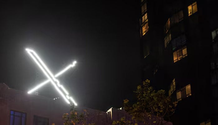 The logo of X, formerly Twitter, can be seen on top of a building in this undated image. — X/File