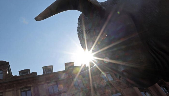 Statue of a bull seen outside an Asian stock market.— AFP/file