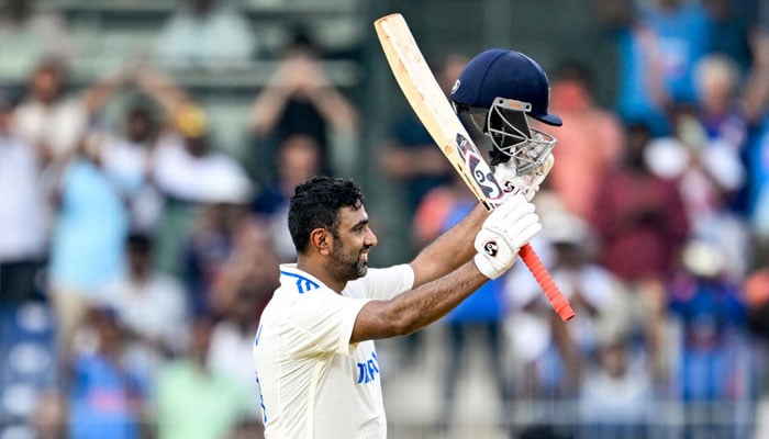 Indias Ravichandran Ashwin celebrates after scoring a century during the first day of the first Test cricket match between India and Bangladesh in Chennai. — AFP/file