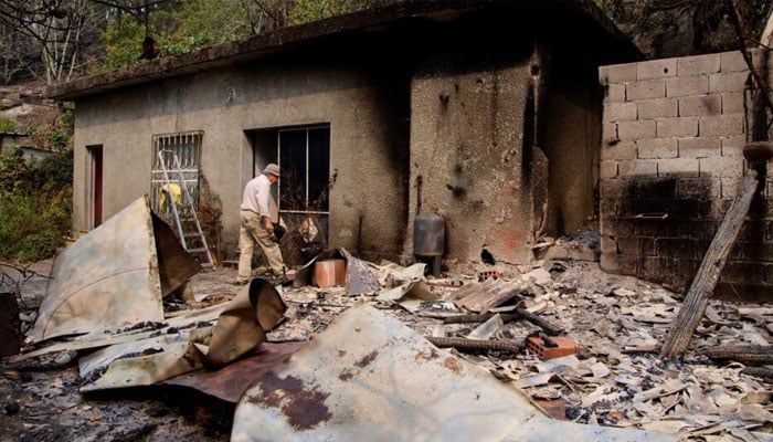 A Portugal home affected by fire.— AFP/file