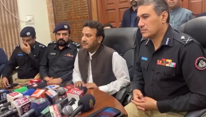 In this screengrab, Sindh Home Minister Ziaul Hasan Lanjar (C) speaks to the media persons along with IG Sindh Ghulam Nabi Memon (R) during a visit to Shikarpur and Kandhkot districts on April 15, 2024. — Facebook/@shahub.dinmallah